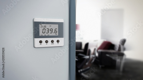 фотографія Wall mounted energy meter beside the room entrance