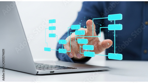 Professional hand interacting with a glowing virtual flowchart, representing data management and strategic planning, ideal for tech articles, business presentations, and innovation concepts.