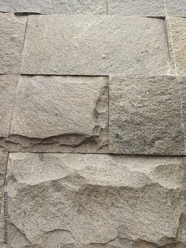 Konstfotografi Close up of rough textured natural stone wall cladding