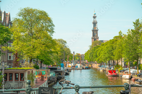 Konstfotografi View of Prinsengracht canal towards Westerkerk in Amsterdam, Netherlands