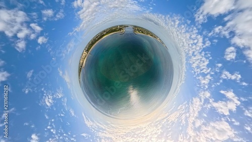 Tiny Planet Perspective: 360-Degree Spherical Aerial View of Jupiter Inlet, Coastline, and Ocean Waters, Florida