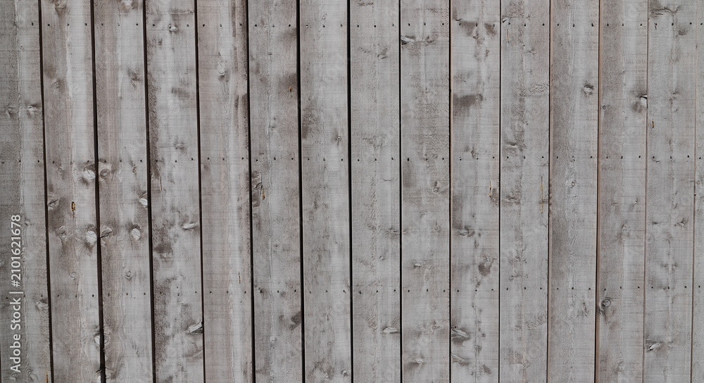 Fototapeta premium Weathered Gray Wooden Plank Wall Background with Rustic Texture