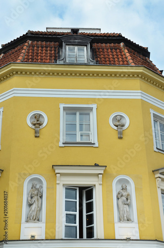 Windows and decorative details of a historic 19th-century building in Warsaw