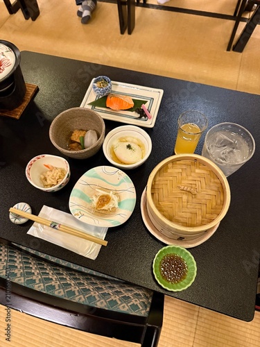 Japanese style ceramic bowl with chopsticks on a table in a restaurant