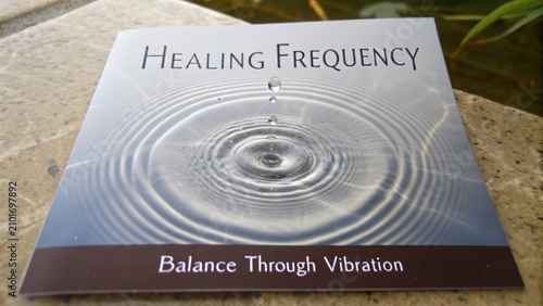 Healing Frequency Concept with Water Droplets Creating Ripples in Tranquil Environment Reflecting Calmness and Balance Vibration