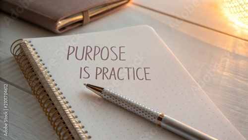 Inspirational Quote in Notebook with Pen, Purpose is Practice, Cozy Workspace Concept, Motivational Writing for Success