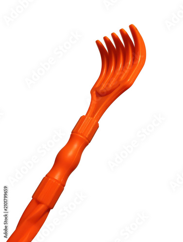 Foto Orange back scratcher with curved tines plastic handle against a black backgroun