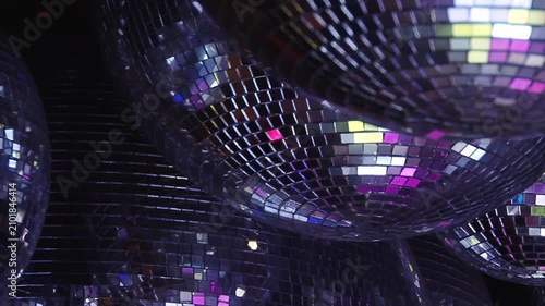 Experience the magical ambiance of a birthday bash under radiant disco lights. Shimmering reflections dance across the energetic club, perfect for a vibrant night celebration.