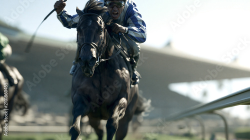 Jockey riding horse in professional race at track. Man competing in high speed equestrian sport. Intense action of racehorse galloping towards finish line. Animal athletics training.