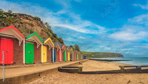 Quadro su tela Colorful beach changing cabins in Swanage, Dorset, England