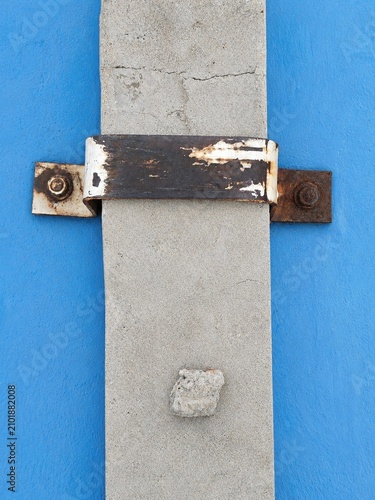 Konstfotografi Minimalist abstract photography of industrial concrete pole with rusty metal cla