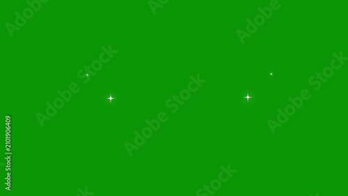 Sparkle particles bloom with gentle light in cinematic motion against a green screen background for motion graphics