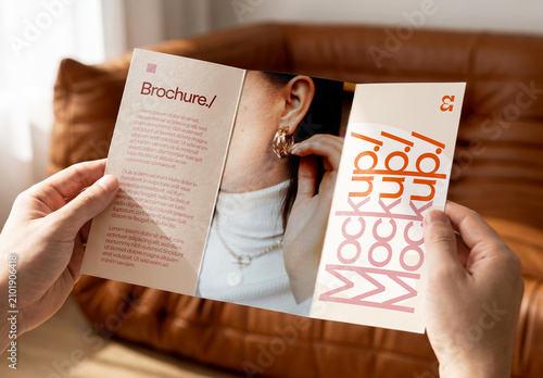 Trifold Brochure Mockup in Hand