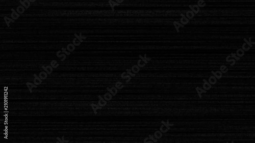 Minimalist black texture with fine horizontal lines and subtle dark surface pattern for modern background design