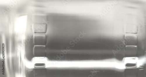 Cuadro en lienzo Curved glass contours blur reflected highlights inside a transparent surface, cr
