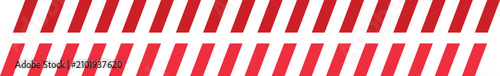 Foto Red and white diagonal stripes warning tape on white background seamless pattern