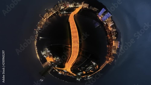 This stunning tiny planet a lively urban night scene featuring a brightly illuminated highway at Andaman Island