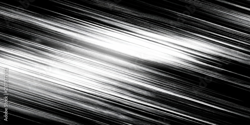 Diagonal white and black streaks of light on dark background moving fast speed