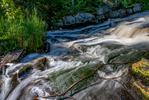 Tranquil cascade at Bunny Trail Falls in lush Ontario forest north of Parry Sound.