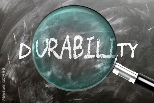 Durability - learn, study and inspect it. Taking a closer look at durability. A magnifying glass enlarging word 'durability' written on a blackboard ,3d illustration
