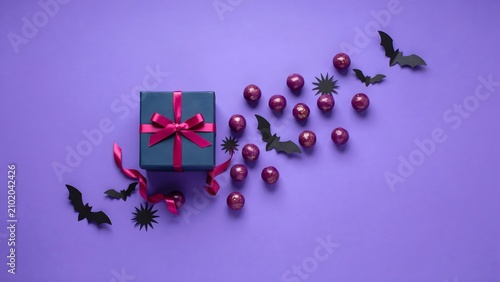 Halloween gift box with purple balls and bat decorations