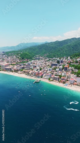 Aerial view of puerto vallarta's los muertos beach and pier in mexico