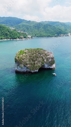 Majestic aerial view of los arcos marine national park with its rock formations in puerto vallarta