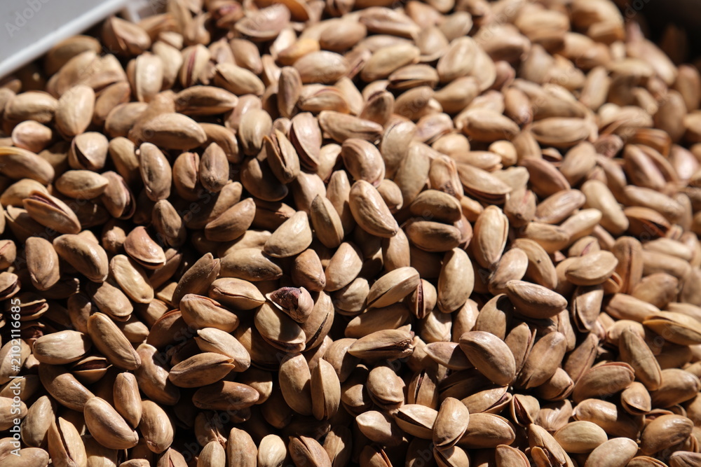 Obraz premium Pistachios, delicious roasted salted pistachios 