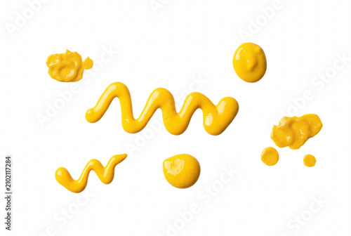Canvastavla Mustard Squeezes and Drops on Dark Surface