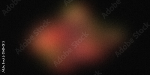 Foto Abstract blurred orange and red light particles on dark background with soft glow effect