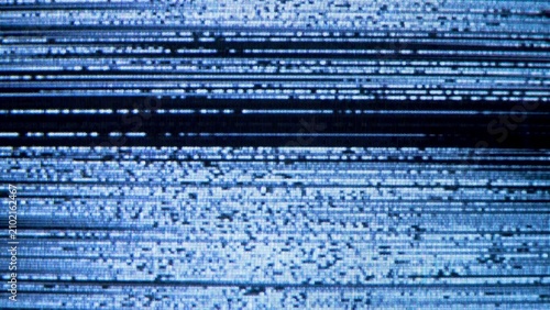 Fotografía Close up of a television screen with blue and white static, depicting a broken signal or analog tv noise