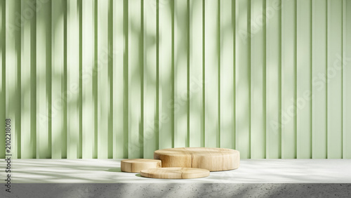 Fotografie Three circular wooden planks of varying sizes are arranged on a cement base