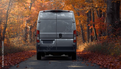 Detailed look at the back of a cargo van stopped by the road.