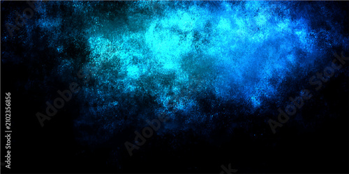 Photos Abstract blue and turquoise nebula cloud formation against a dark cosmic background, representing deep space or an ethereal phenomenon, with glowing particles and a sense of mystery