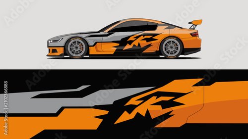 Foto Orange and black sports car vehicle.