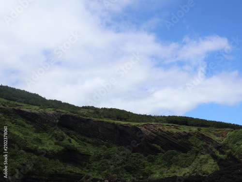 Volcanic coastal cliff near Udobong on Udo Island, Jeju, South Korea