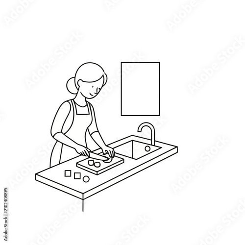 Woman chopping vegetables in the kitchen