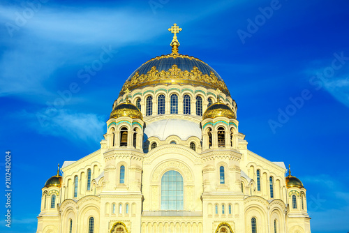 Kronstadt Naval Cathedral of Saint Nicholas Golden Dome with Cross Close Up on Blue Sky