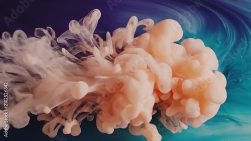 Abstract fluid art background with swirling blue and purple paint