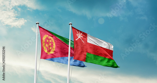 Foto Eritrea Oman friendship flags are waving in the sky
