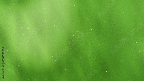 Abstract fresh green background with texture, light leaks, and sparkling particles