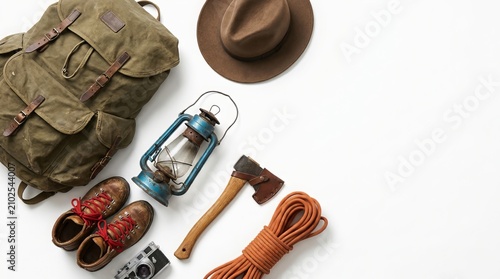 Vintage Adventure Gear Flat Lay with Backpack, Boots, and Camping Essentials