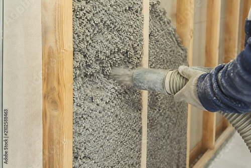 Eco-Friendly Cellulose Insulation Installation in House Attic – Sustainable Home Energy Efficiency