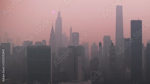 Aerial view of New York City covered in smoke
