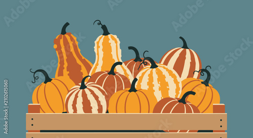 Assorted pumpkins and gourds displayed in a wooden crate for autumn harvest