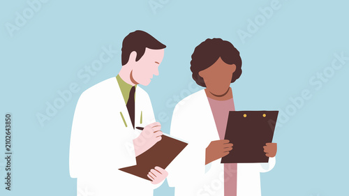Medical professionals discuss patient care in a clinical setting during daytime