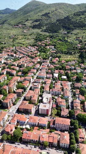 Aerial panorama of Prato under clear summer morning light.