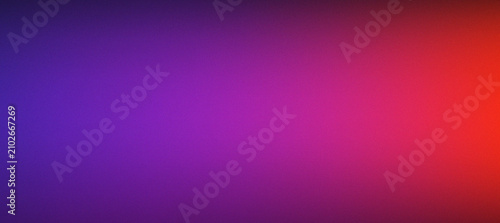 Bright vivid blue fading into purple and vibrant red grainey gradient background