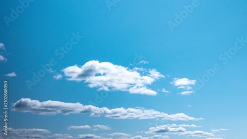 White Cumulus Clouds Drifting Across Blue Sky Time-Lapse, Summer Weather, Clean Air Background.