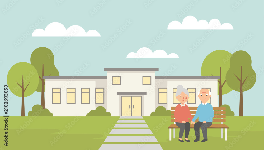 Naklejka premium Happy senior couple holding hands while sitting on a wooden bench in front of a modern nursing home or hospital building.